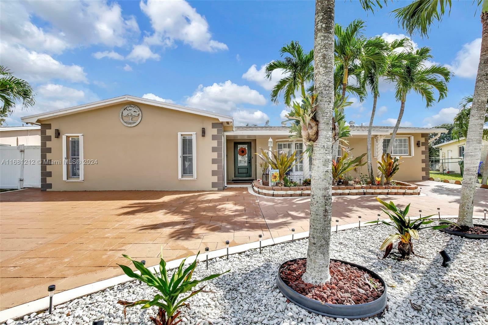 Property Photo:  301 NW 93rd Ave  FL 33024 