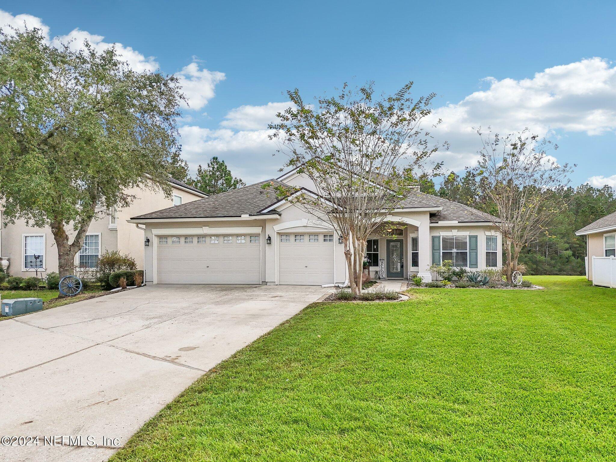 Property Photo:  1405 Canopy Oaks Drive  FL 32065 