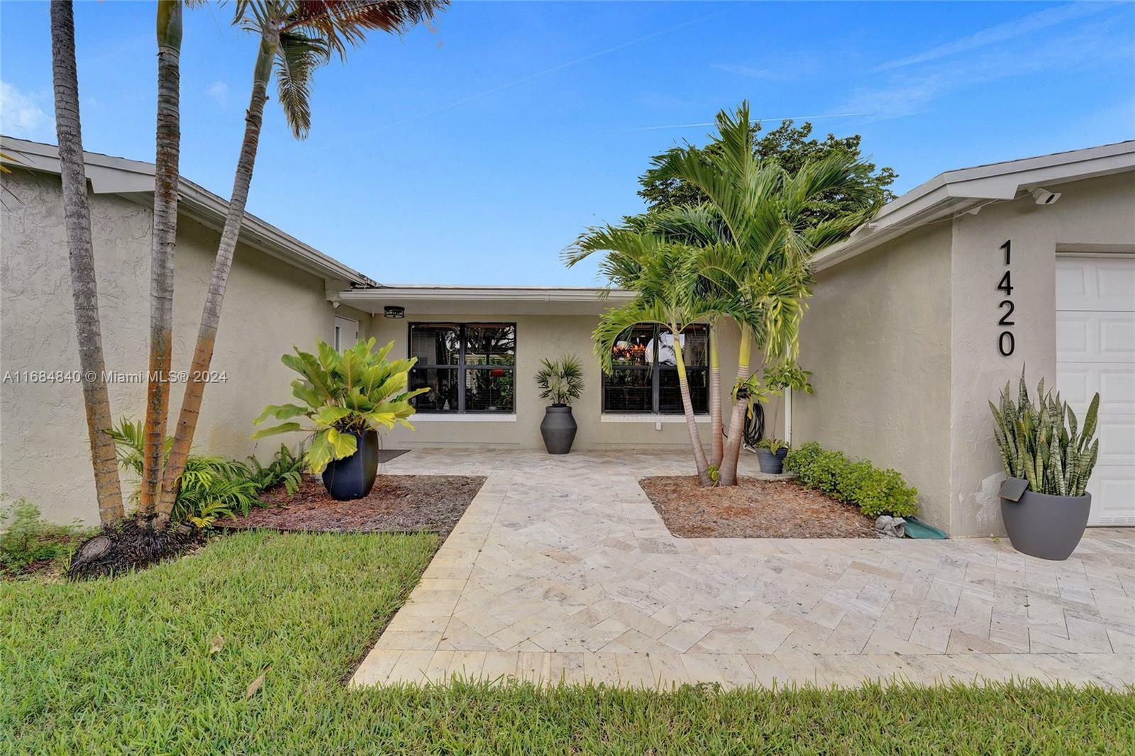 Property Photo:  1420 NW 114th Ave  FL 33026 