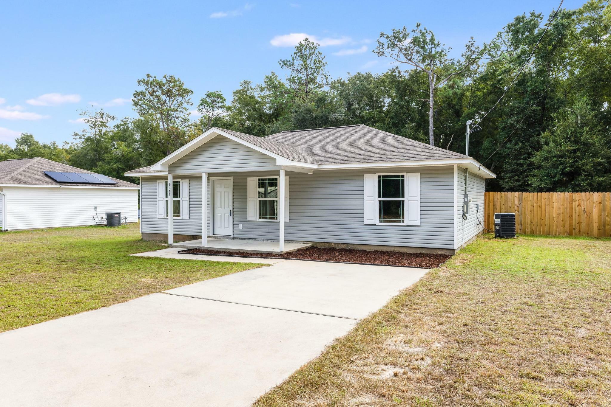 Property Photo:  6037 Children Street  FL 32570 