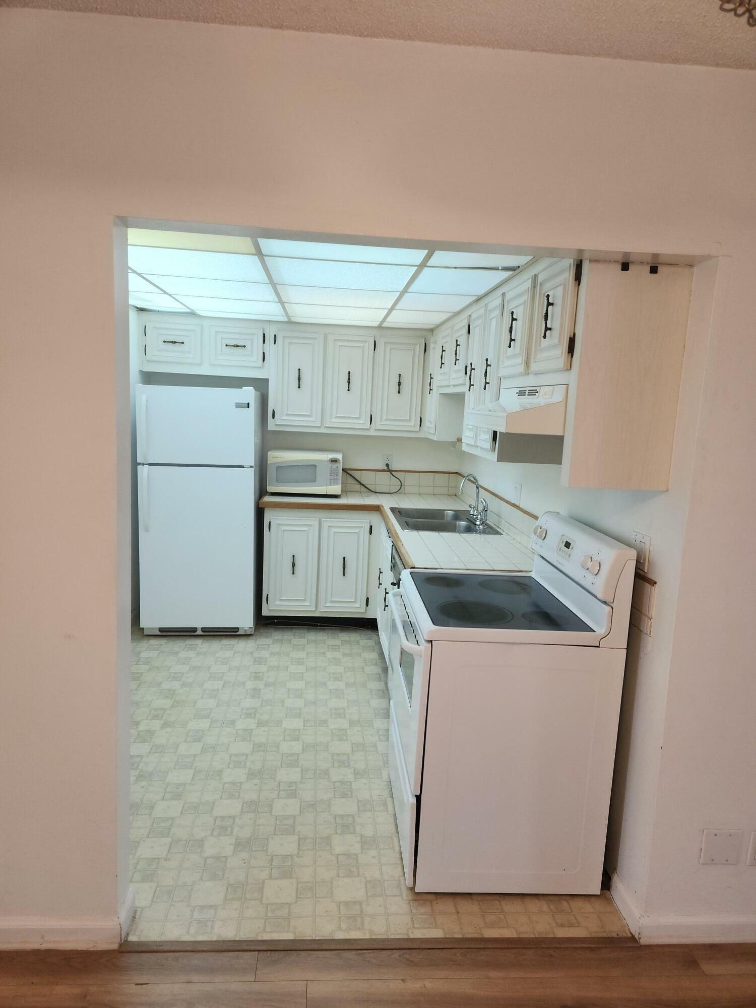 Property Photo:  959 SE 2nd Avenue 134  FL 33441 