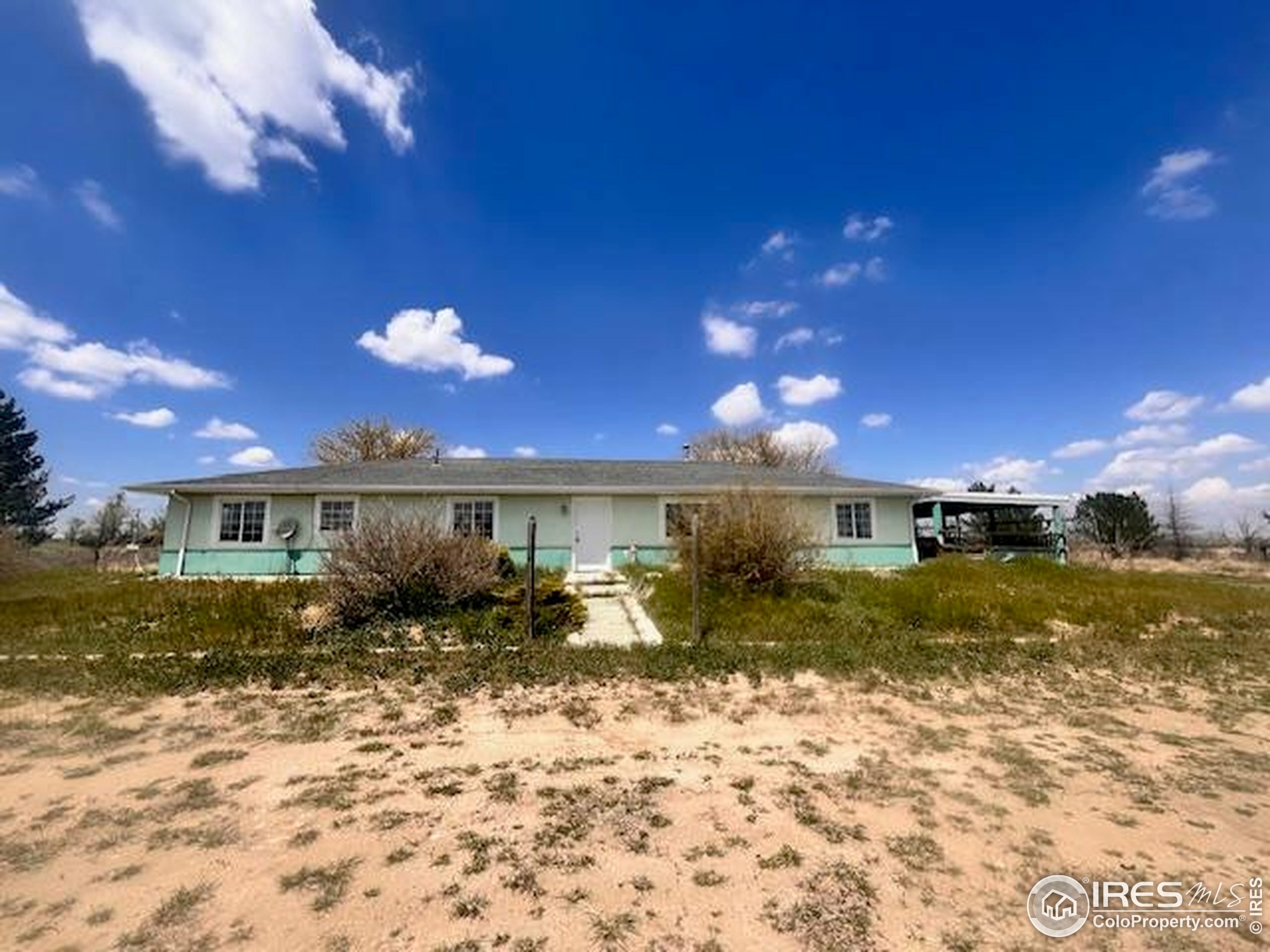 Property Photo: 18542 County Road 8 CO 80654