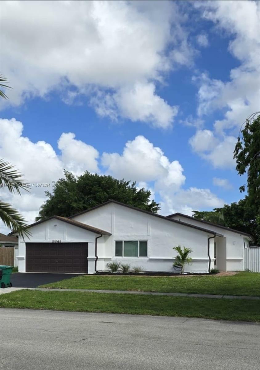 Property Photo:  19949 NW 62nd Ave  FL 33015 