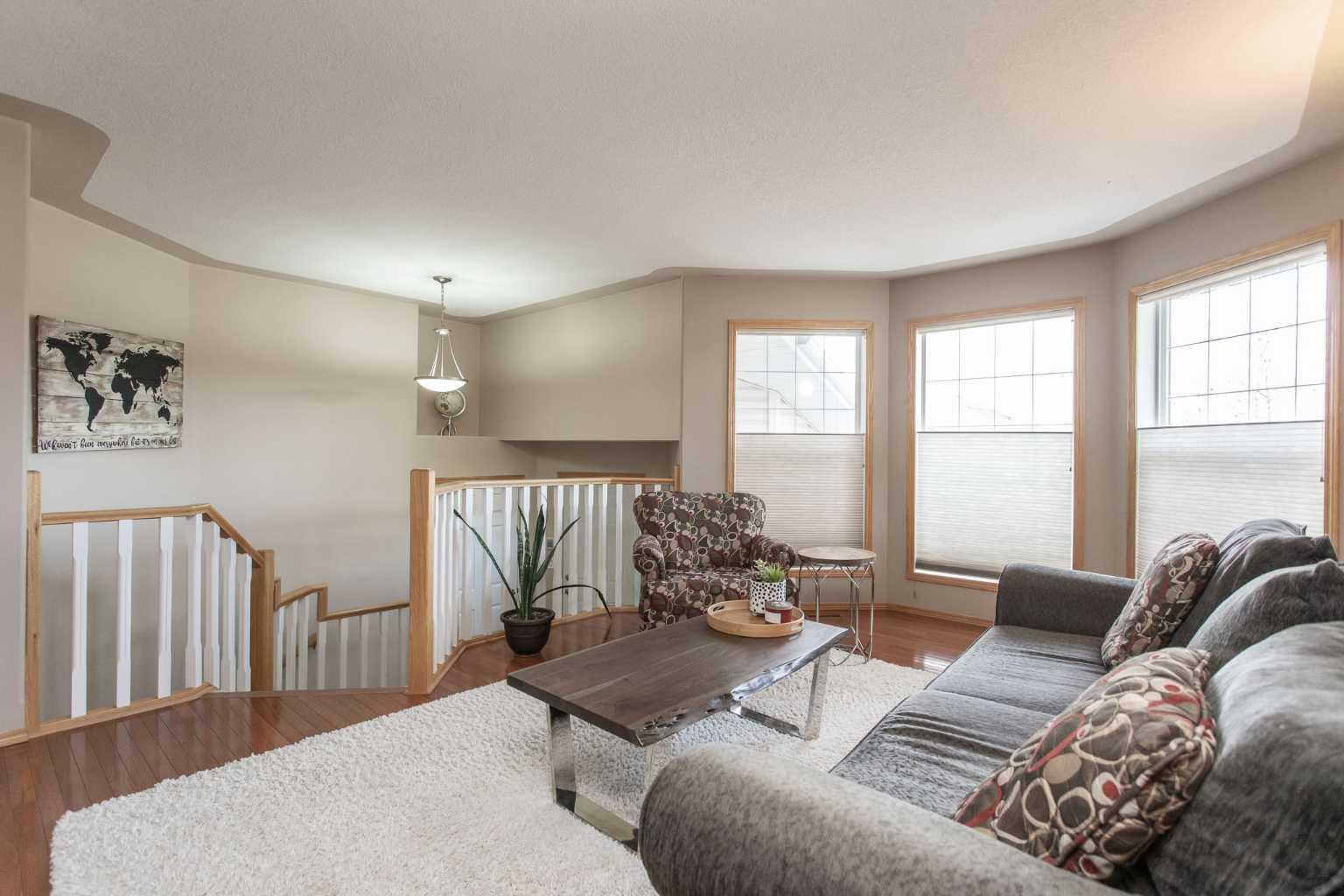 Property Photo:  122 Langford Crescent  AB T4R 3E5 