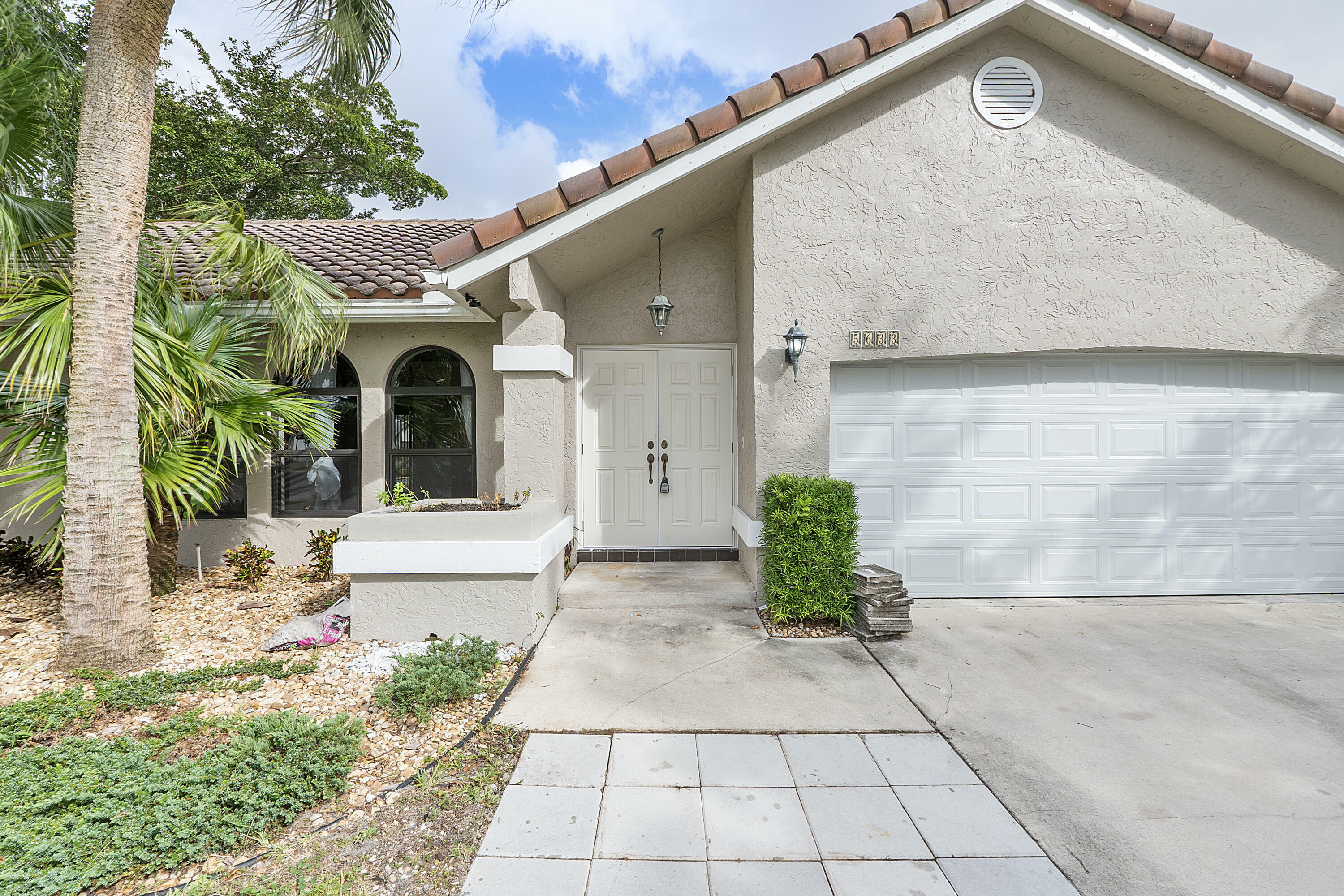 Property Photo:  5633 NW 61st Avenue  FL 33067 