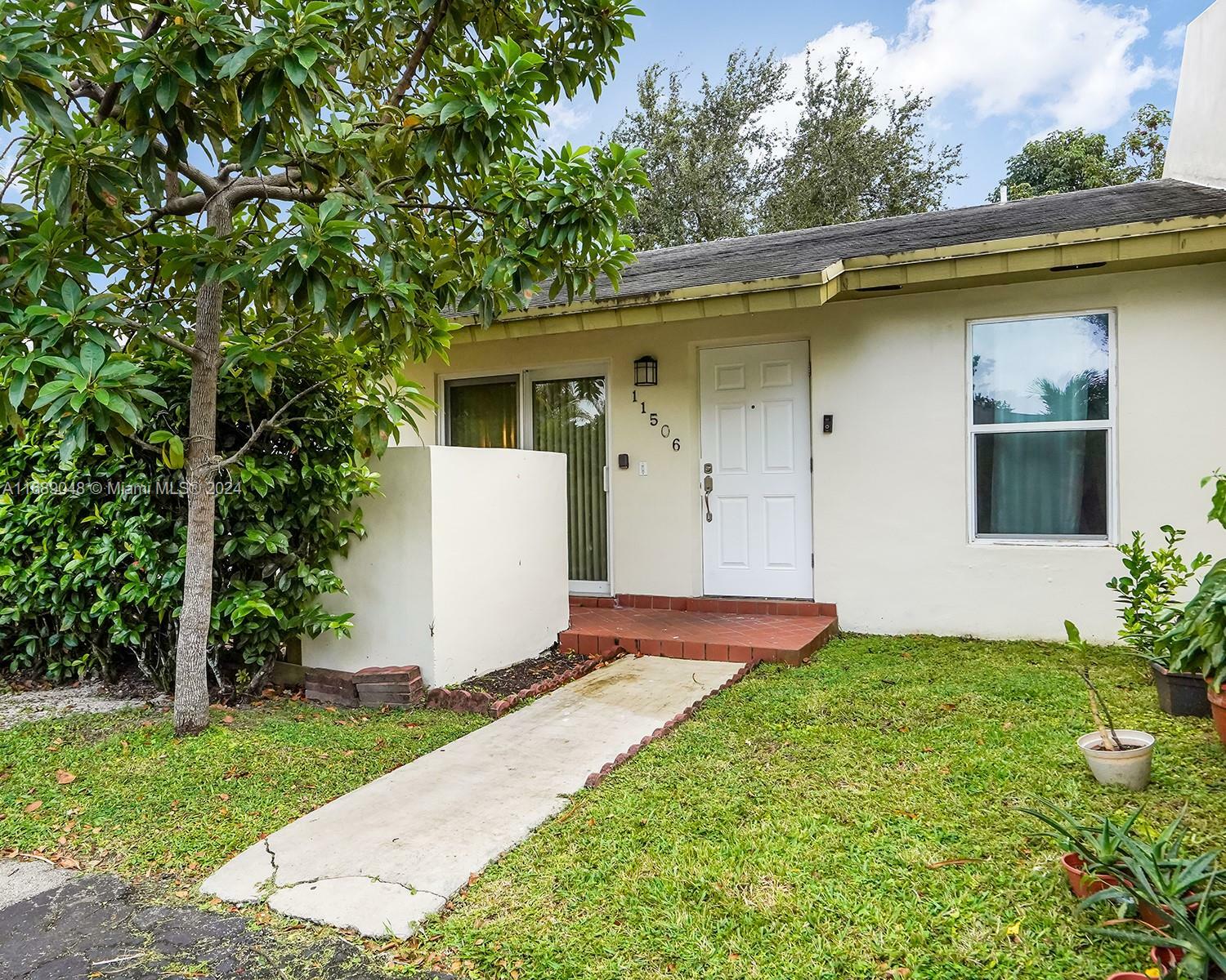 Property Photo:  11506 SW 124th Pl  FL 33186 