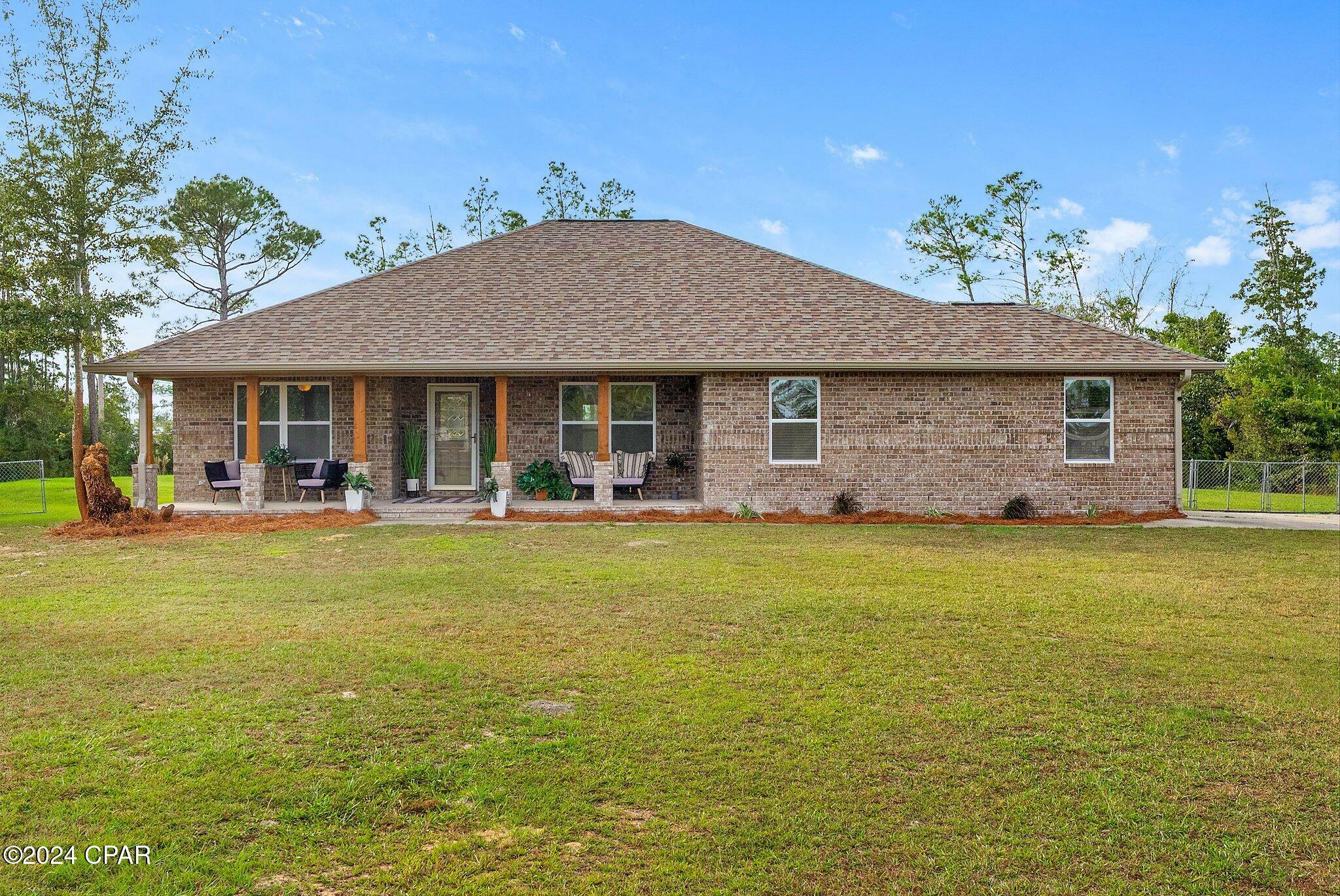 Property Photo:  8113 S McCann Road  FL 32409 