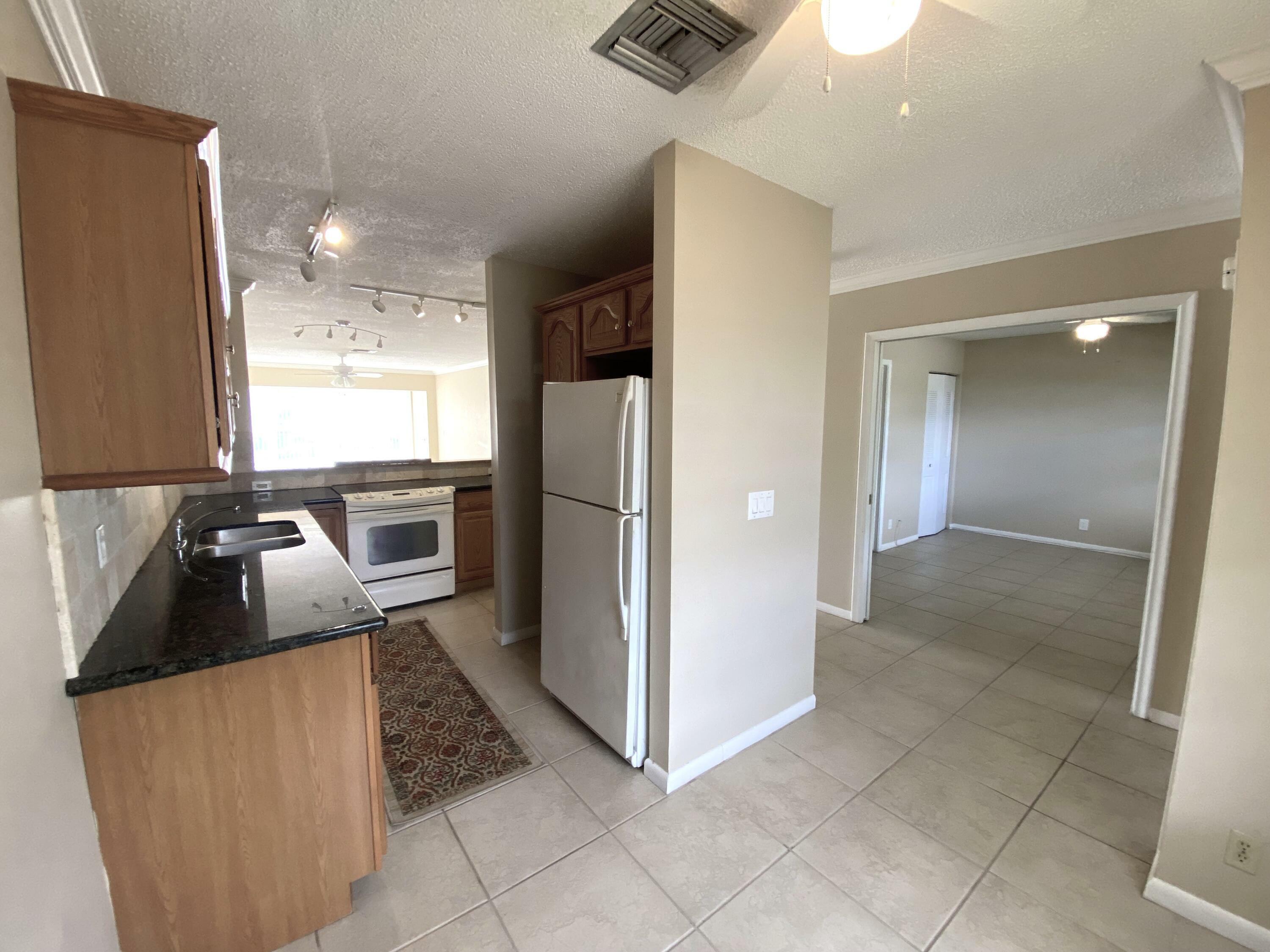 Property Photo:  2500 Black Olive Boulevard 202  FL 33445 