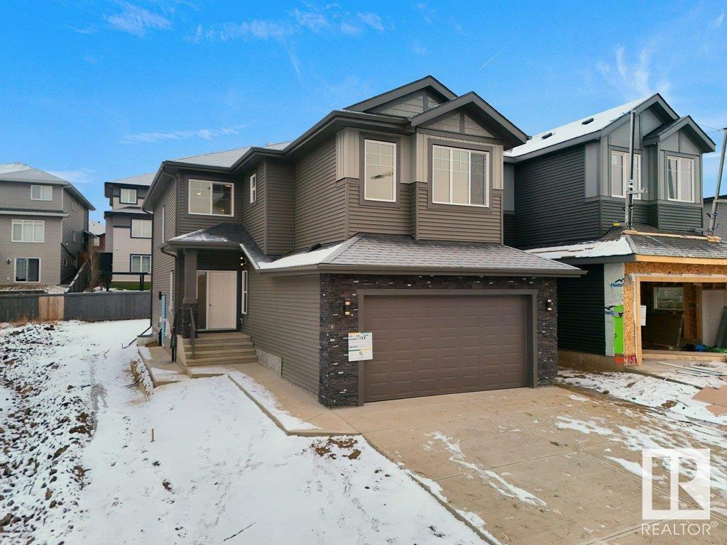 Property Photo:  1158 Gyrfalcon Crescent NW  AB T5S 0S1 