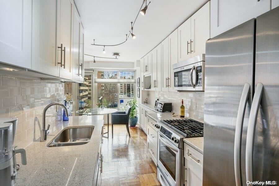 Property Photo: 166-25 Powells Cove Boulevard 2G NY 11357