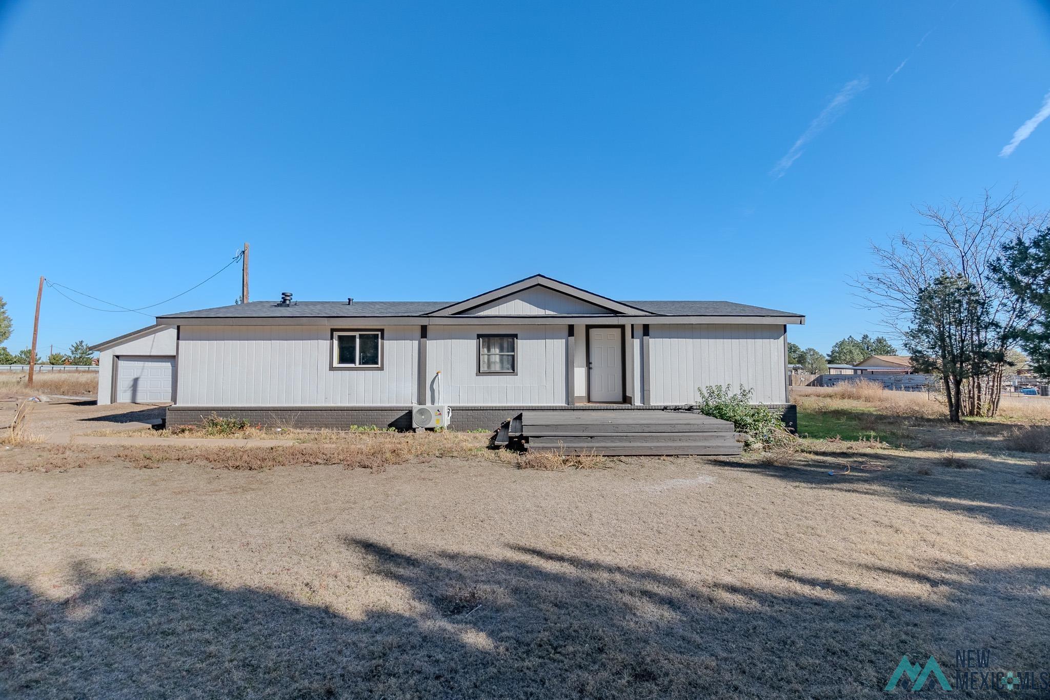 Property Photo:  317 Frontier Road  NM 88101 
