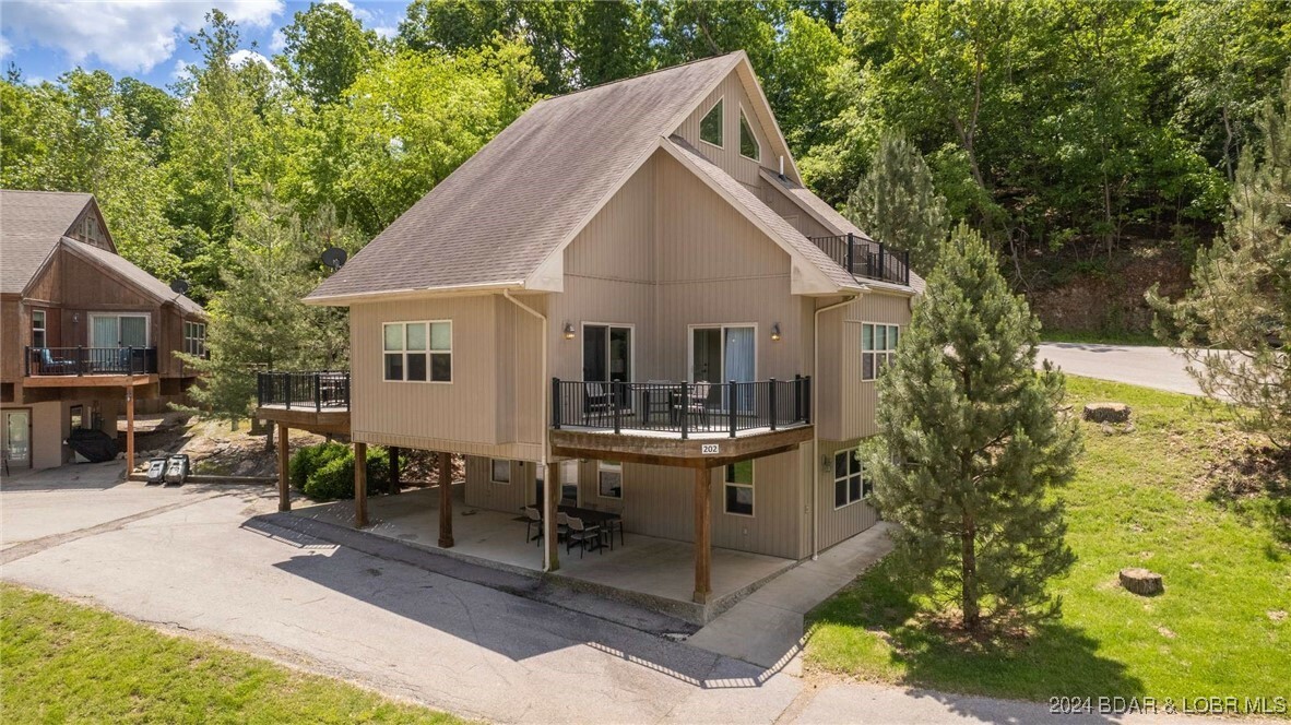 Property Photo:  202 Ozark Yacht Club Landing Drive Cedar  MO 64049 