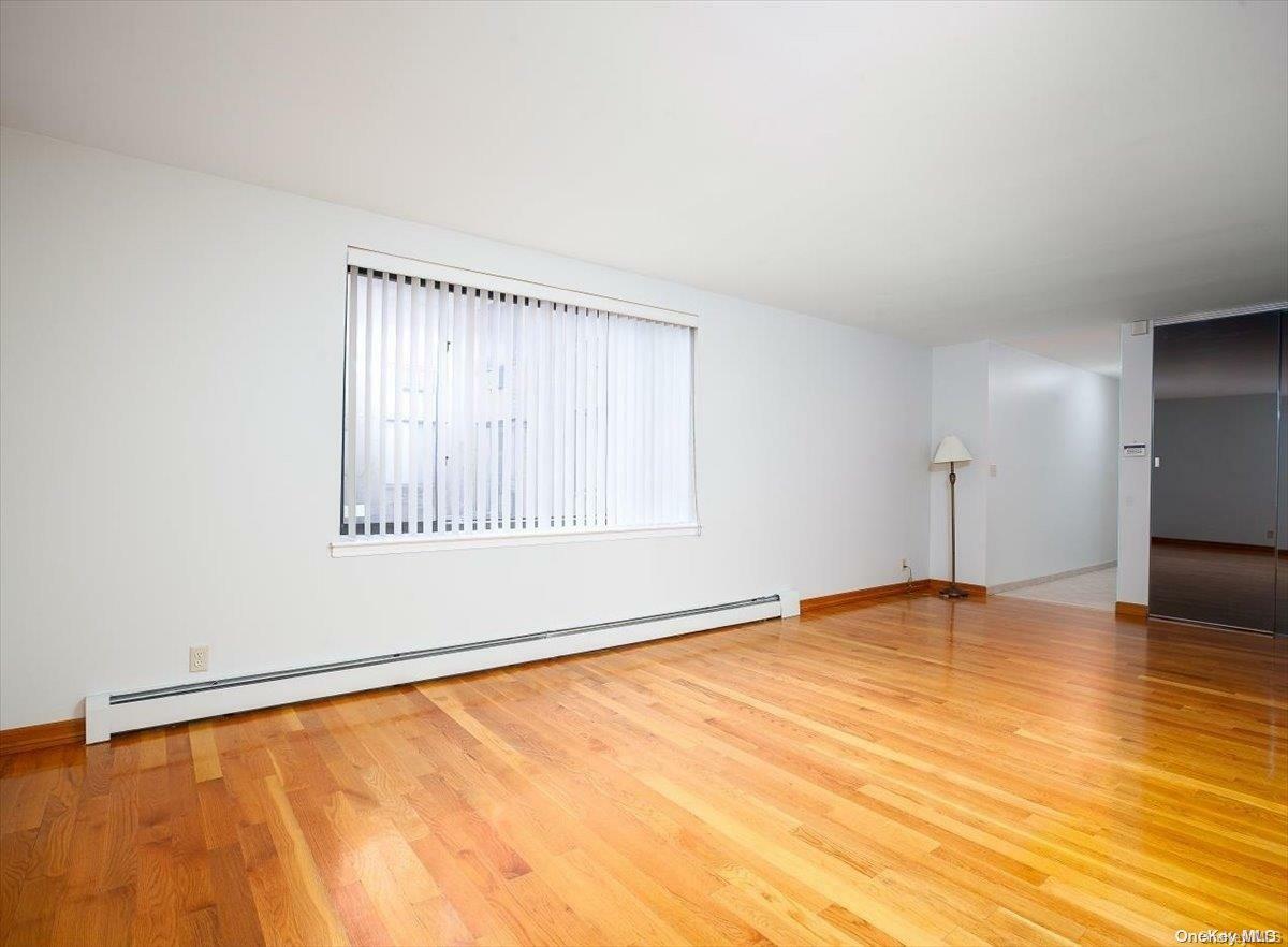 Property Photo:  66-70 79th Street 1C  NY 11379 