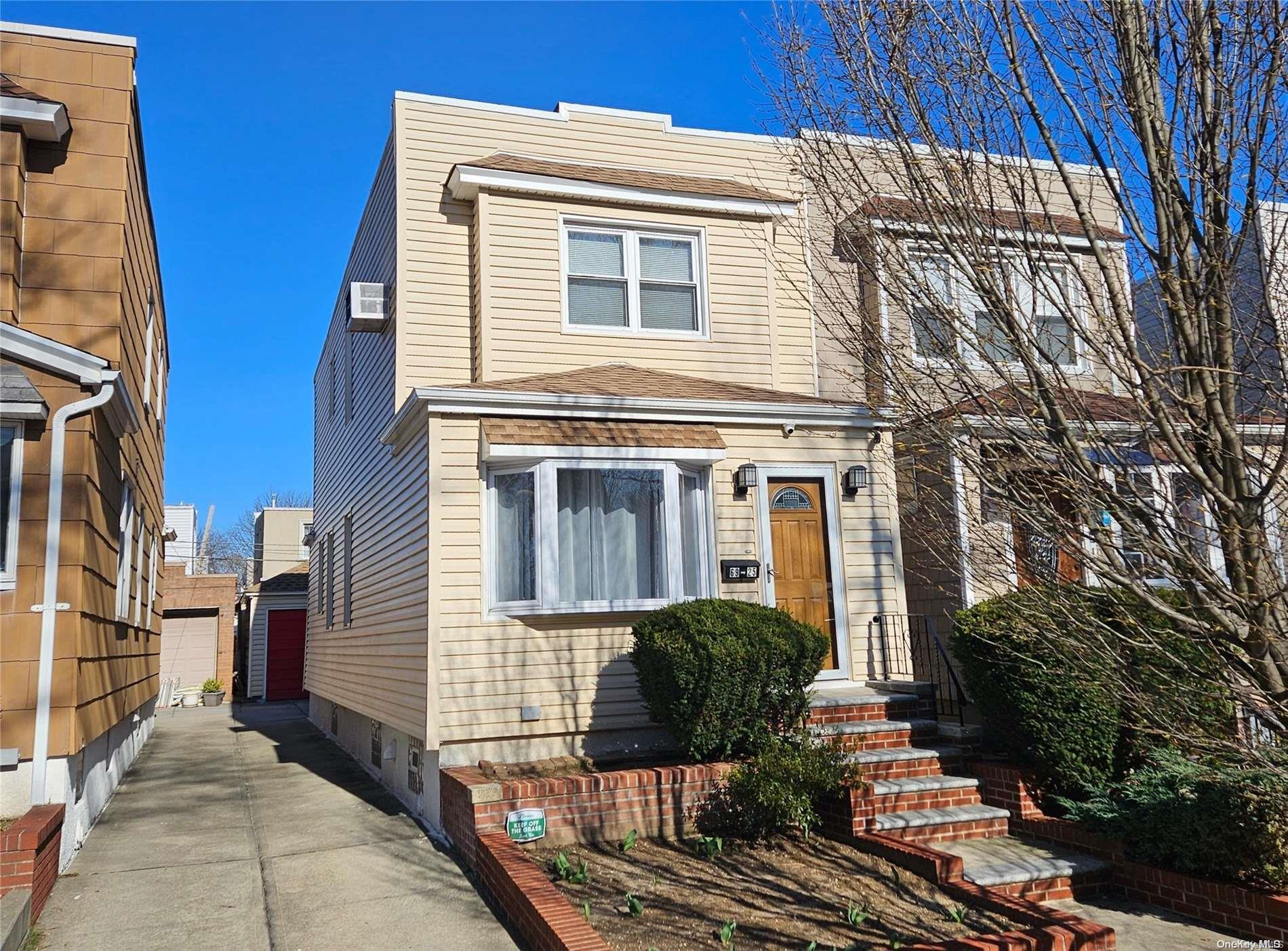 Property Photo: 69-25 67th Place NY 11385