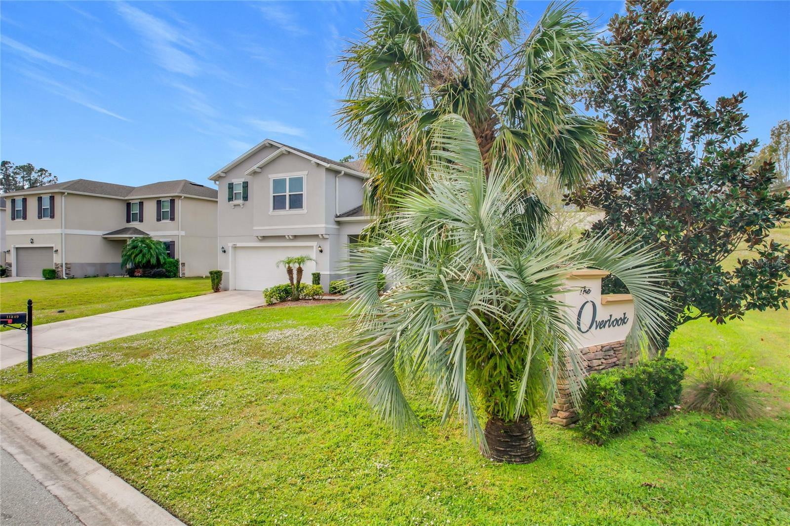 Property Photo: 11449 Wishing Well Ln FL 34711