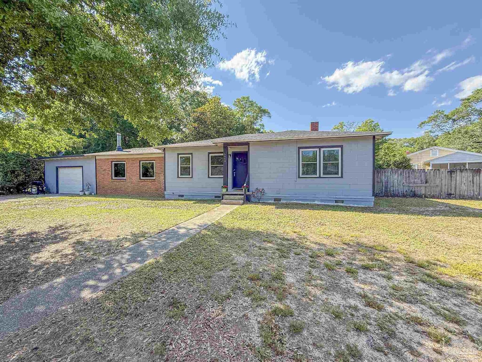 Property Photo:  6668 Maple St  FL 32570 