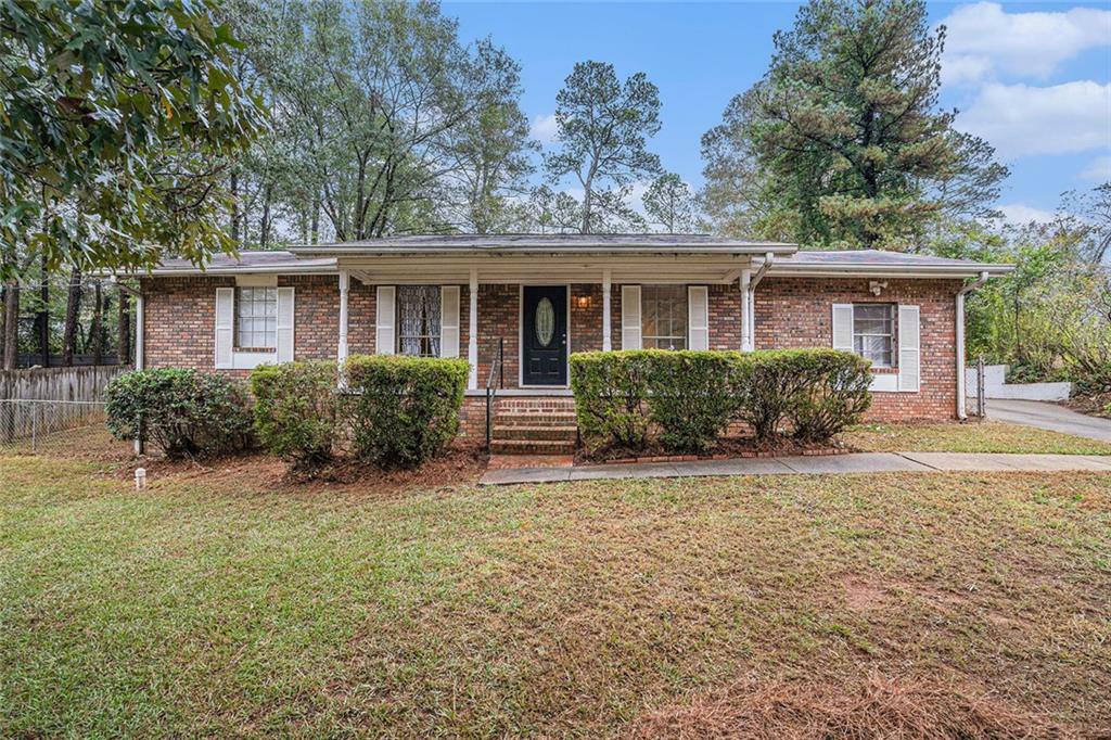 Property Photo:  1002 Millwood Drive SW  GA 30008 