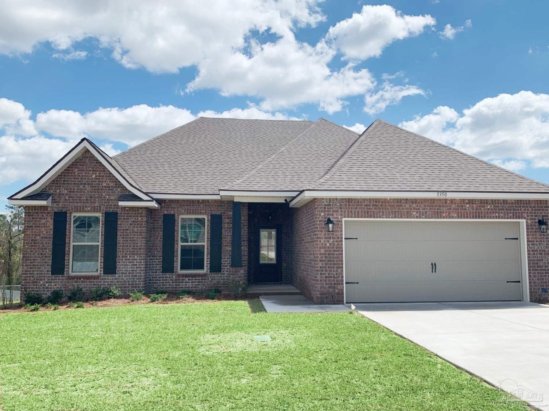 Property Photo: 5350 Adeline Cir 13-A (Lot #) FL 32571