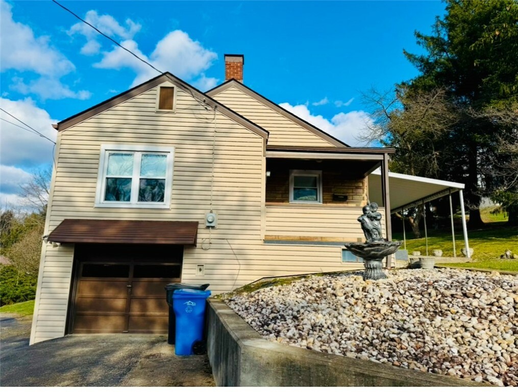 Property Photo:  10439 Jefferson Ave  PA 15642 