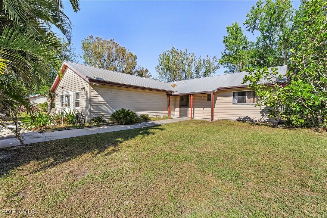 Property Photo:  4754 Woodstock Road  FL 33956 