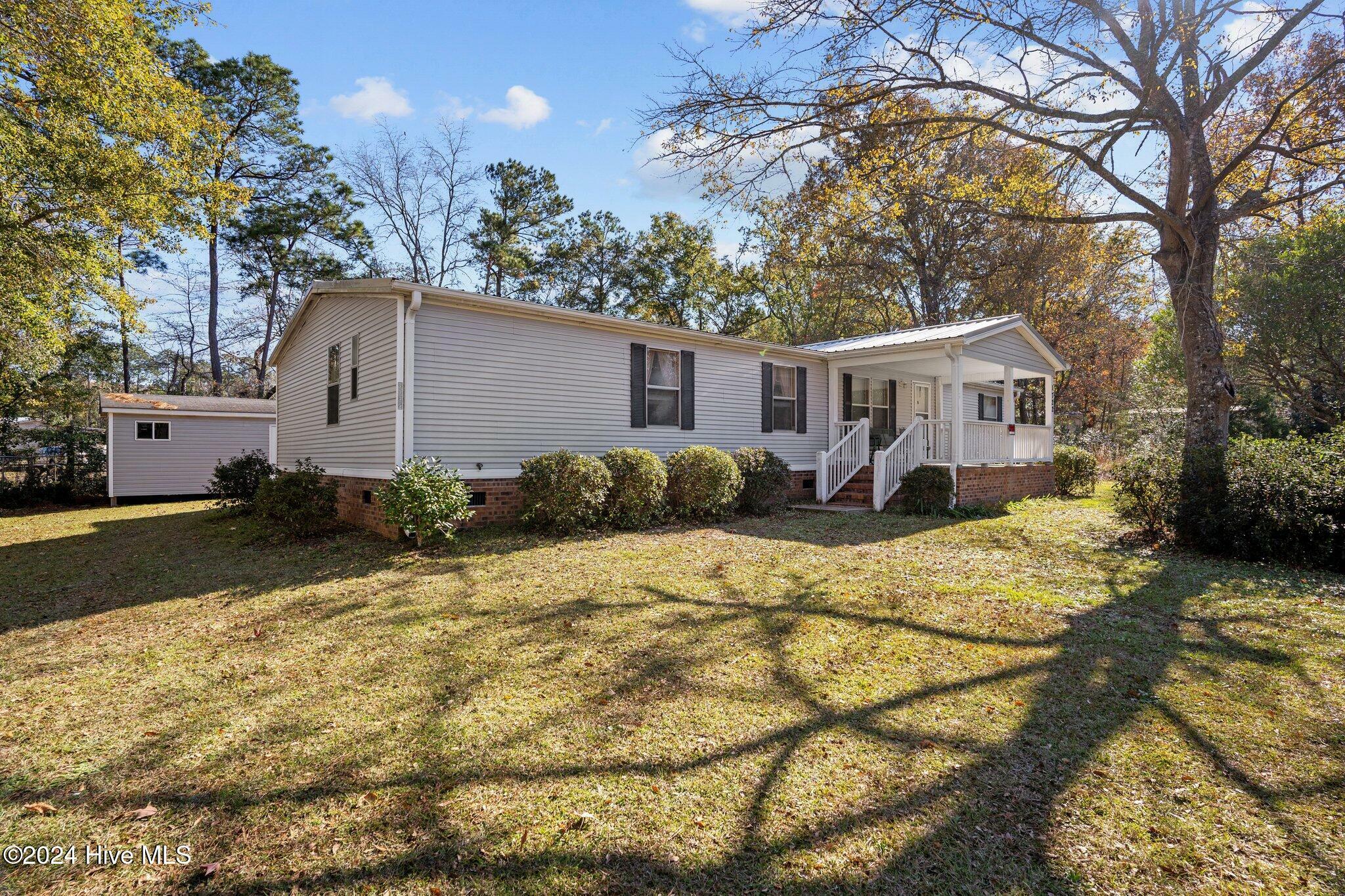 Property Photo:  1722 Balsam Drive SW  NC 28462 