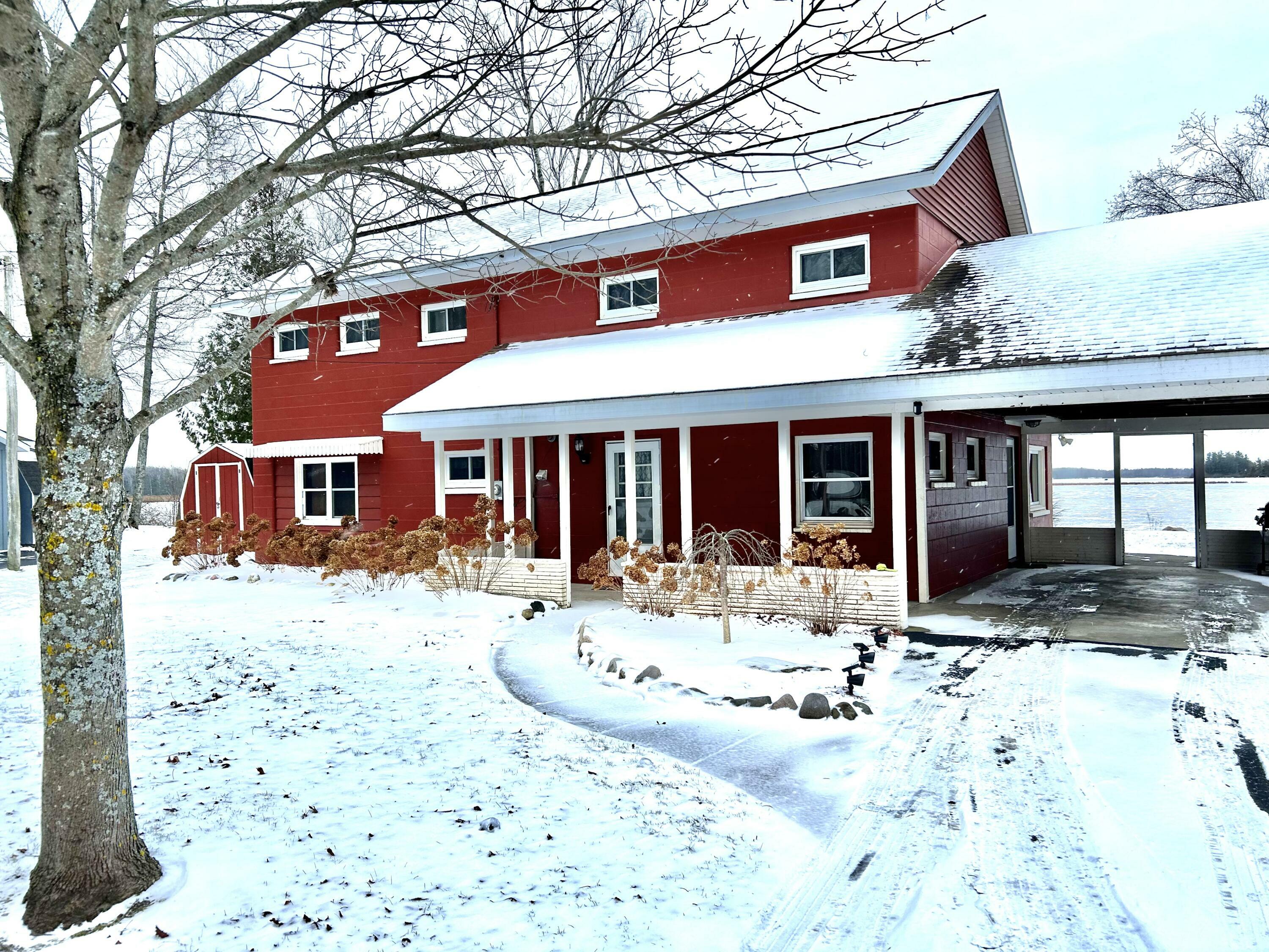 Property Photo:  4507 Long Rapids Road  MI 49707 