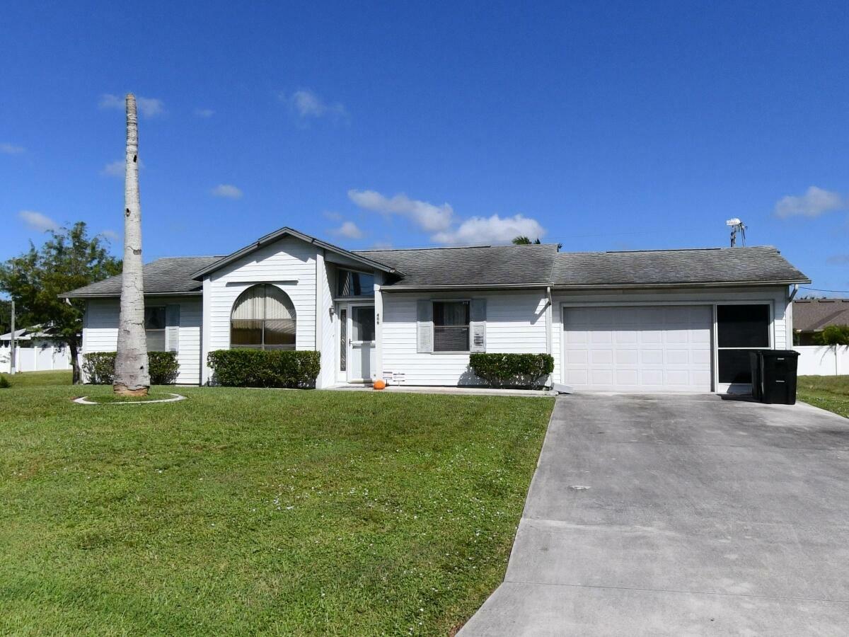 Property Photo:  409 SW Voltair Terrace  FL 34984 