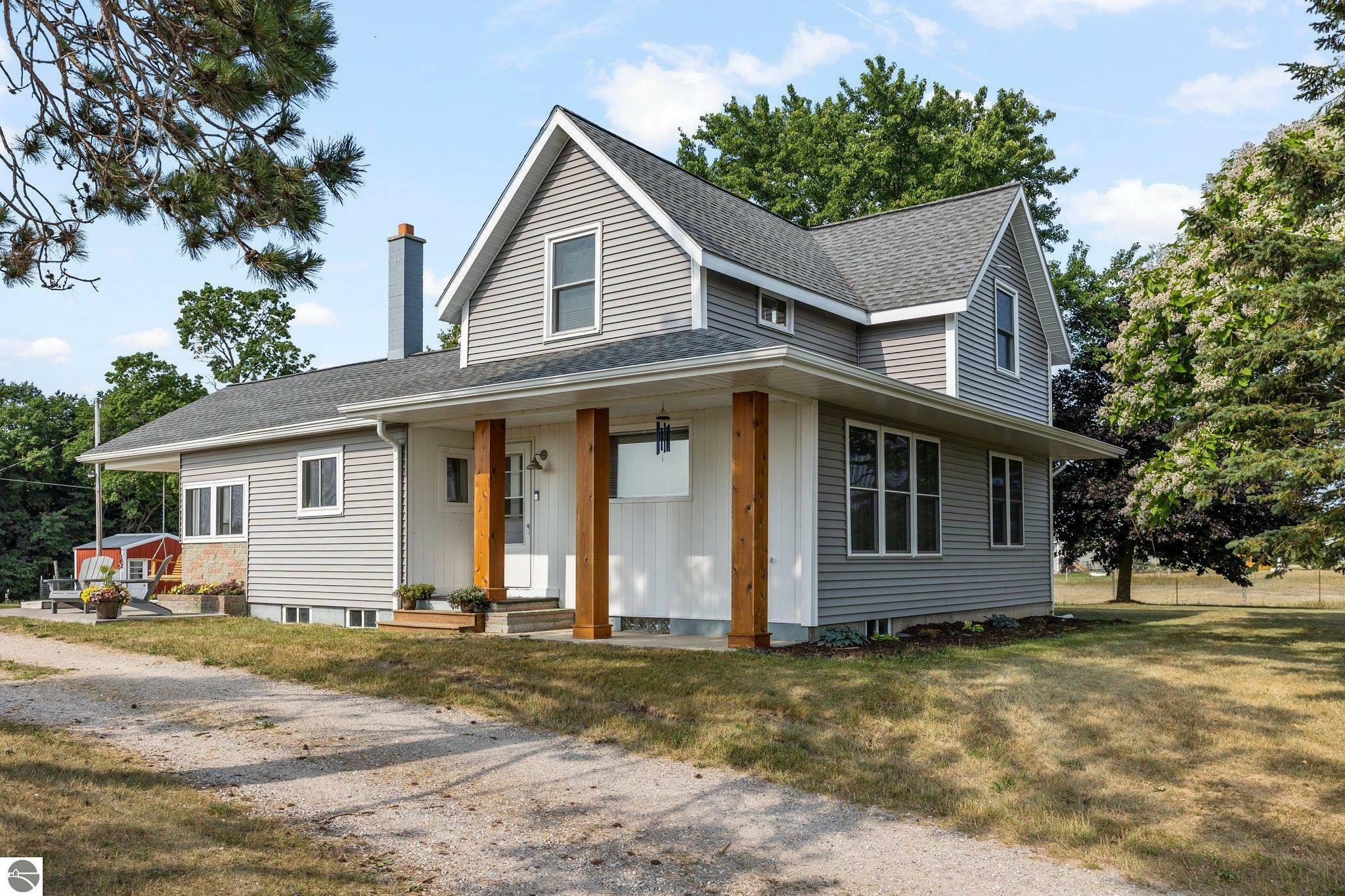 Property Photo:  6109 W County Line Road  MI 49620 