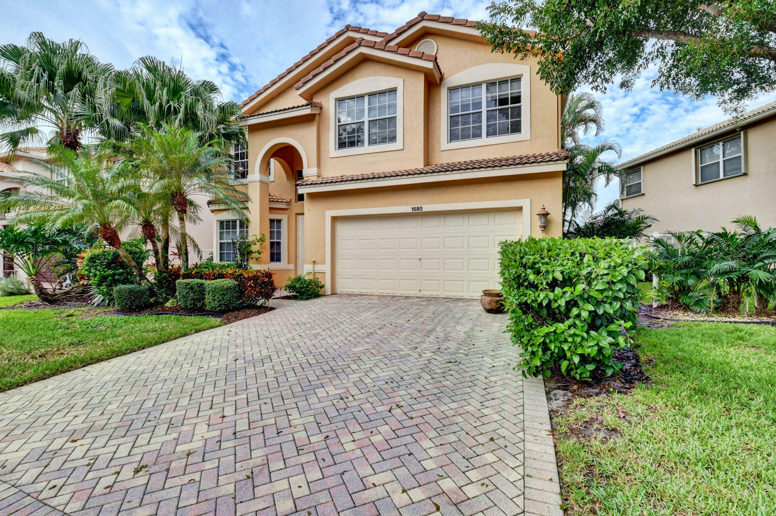 Property Photo:  1680 E Classical Boulevard  FL 33445 