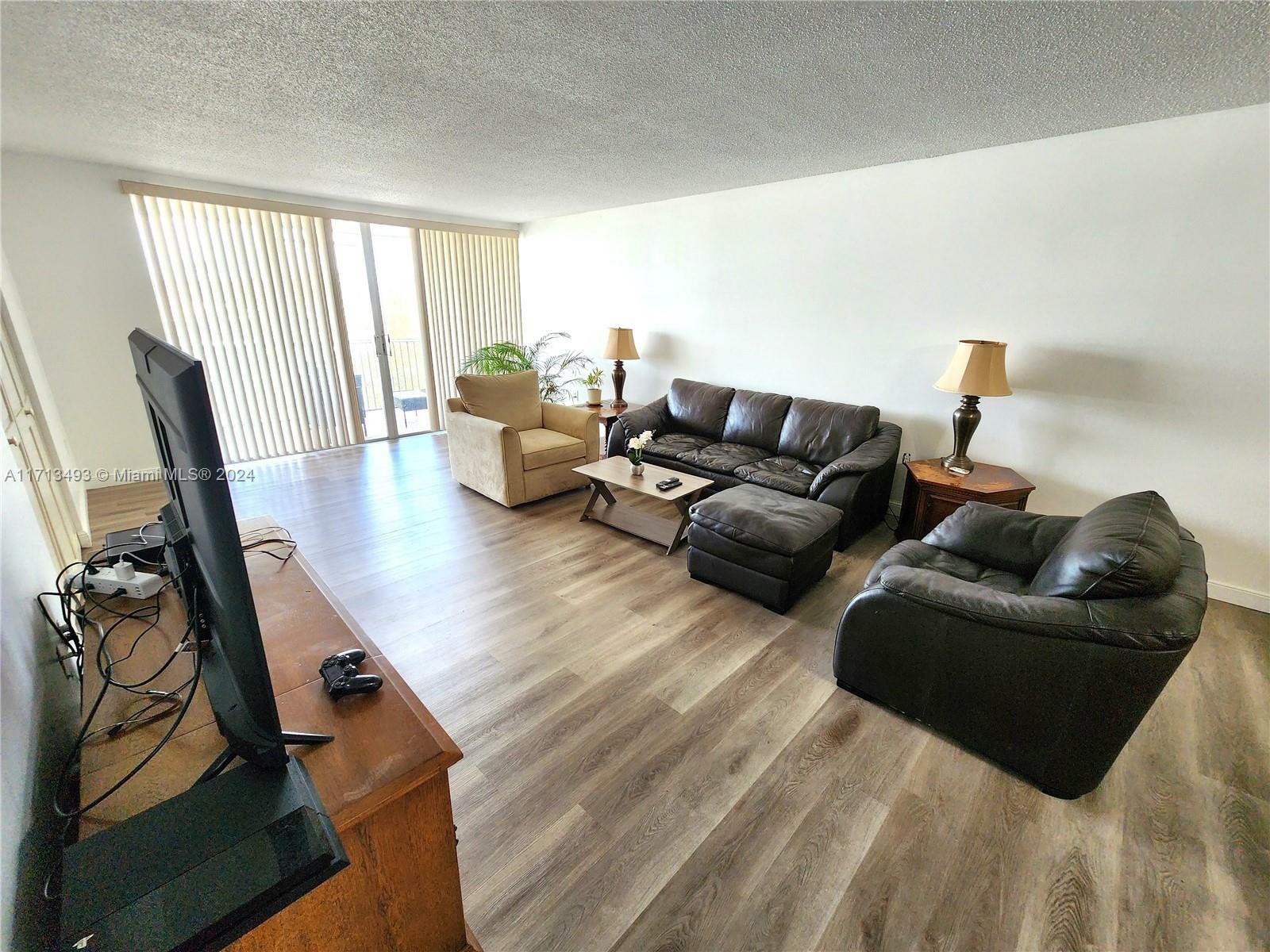 Property Photo:  1690 NE 191st St 414-1  FL 33179 