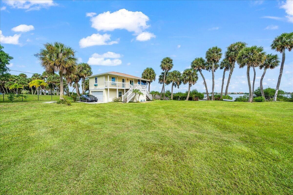 Property Photo: 10060 S Tropical Trail FL 32952