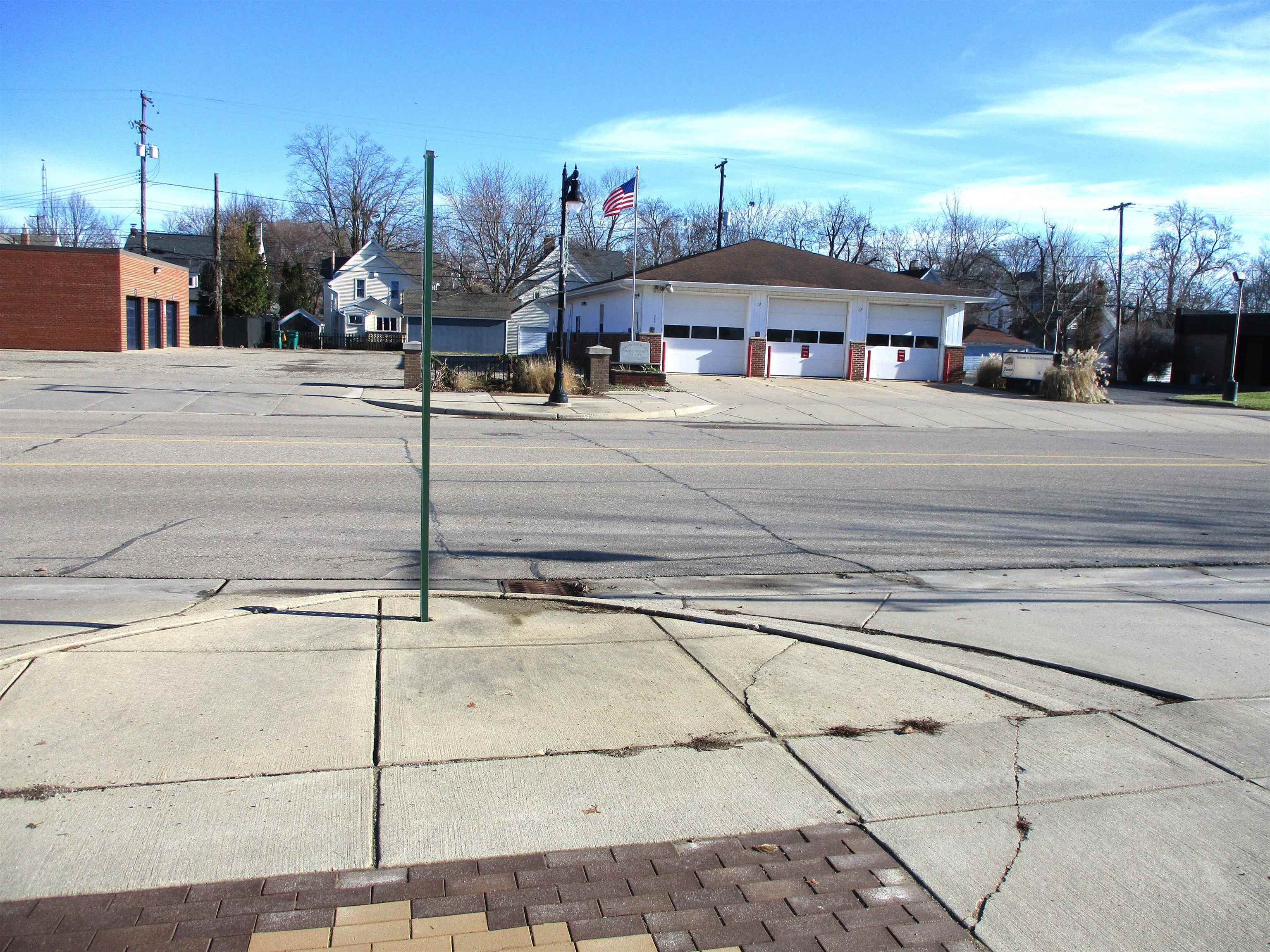 Property Photo:  305 N Saginaw Street  MI 48429 