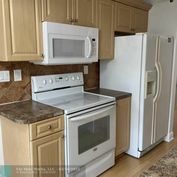 Property Photo:  8305 NW 61st St C307  FL 33321 