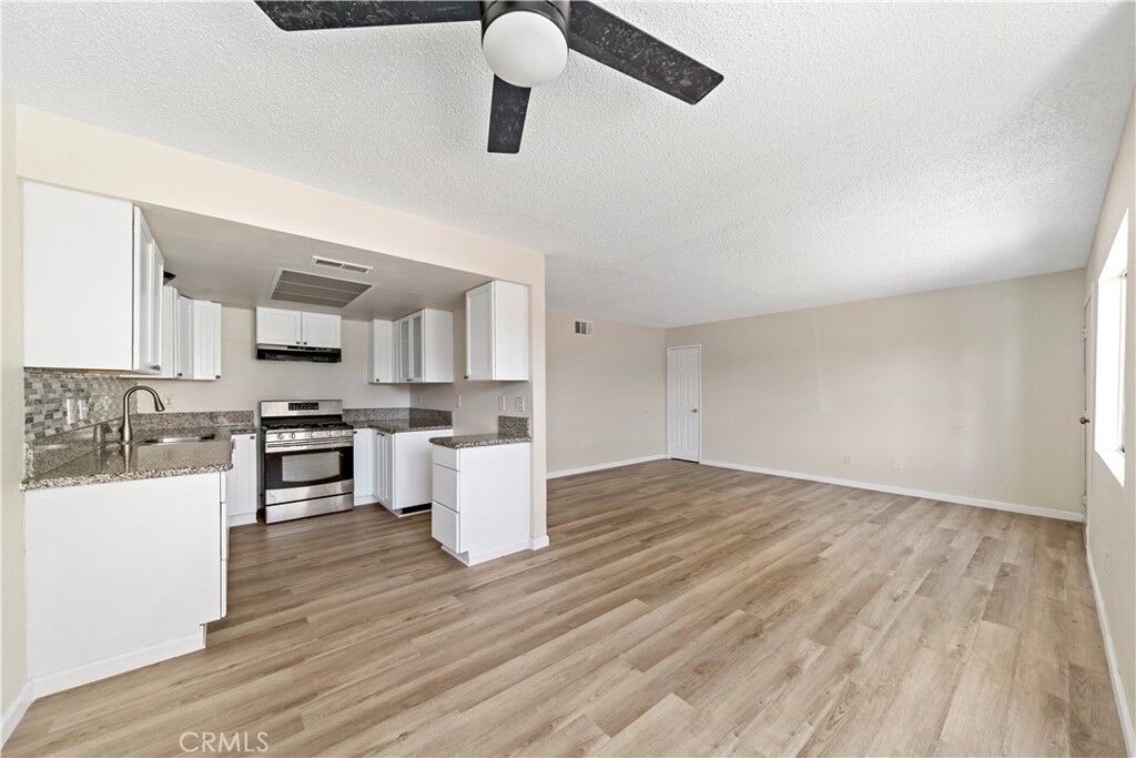 Property Photo:  8998 Mango Ave C  CA 92335 