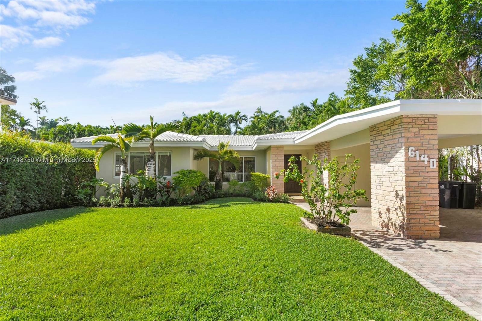 Property Photo:  6140 Pine Tree Drive  FL 33140 