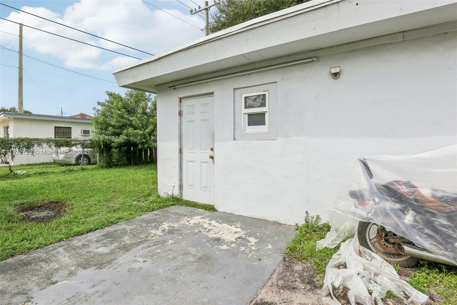 Property Photo:  2406 NW 67th St  FL 33147 