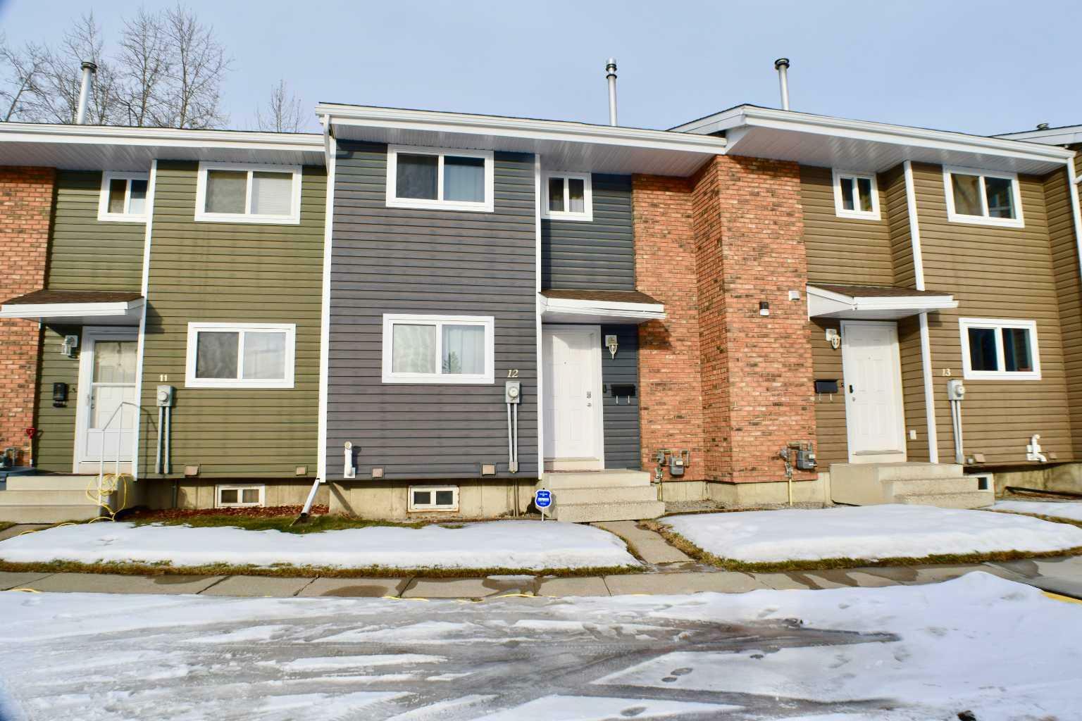 Property Photo:  5806 61 Street 12  AB T4N 6H4 