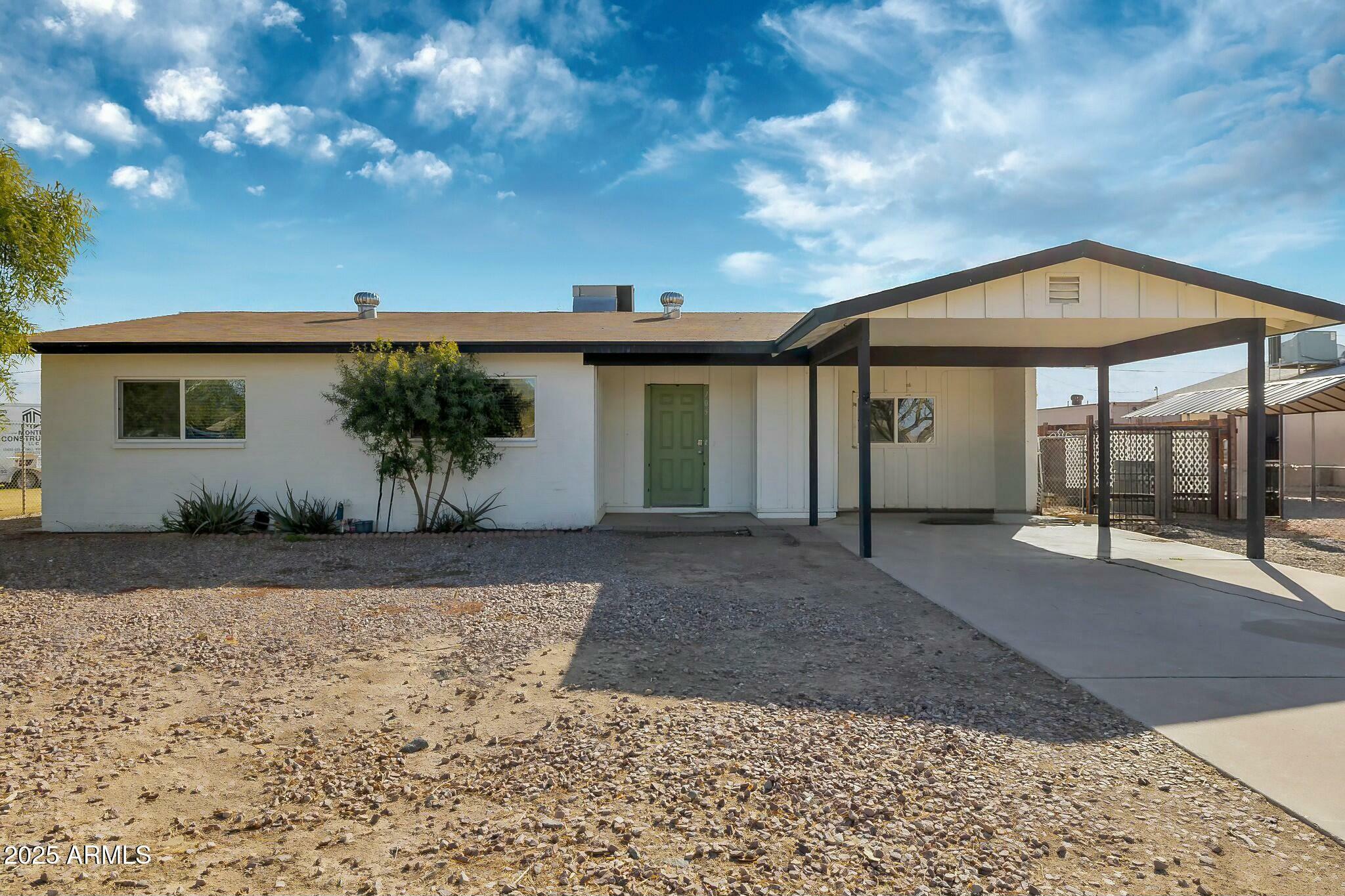 Property Photo:  105 W Baseline Road  AZ 85326 