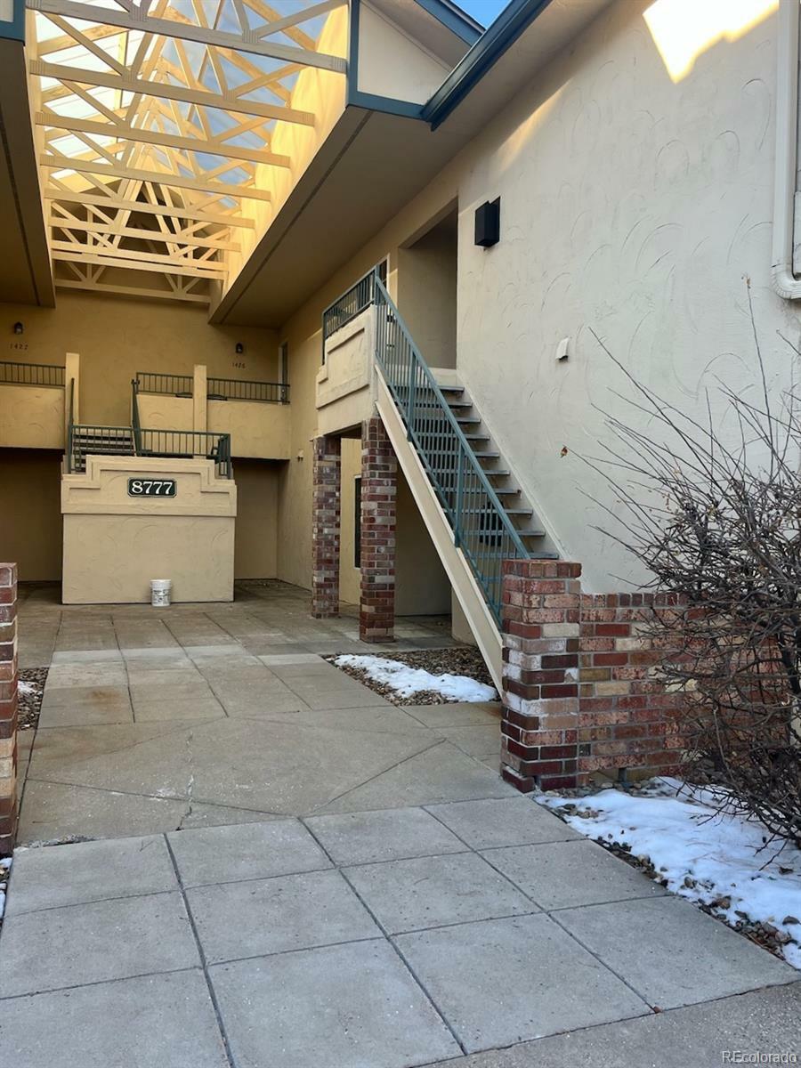 Property Photo: 8777 E Dry Creek Road 1412 CO 80112
