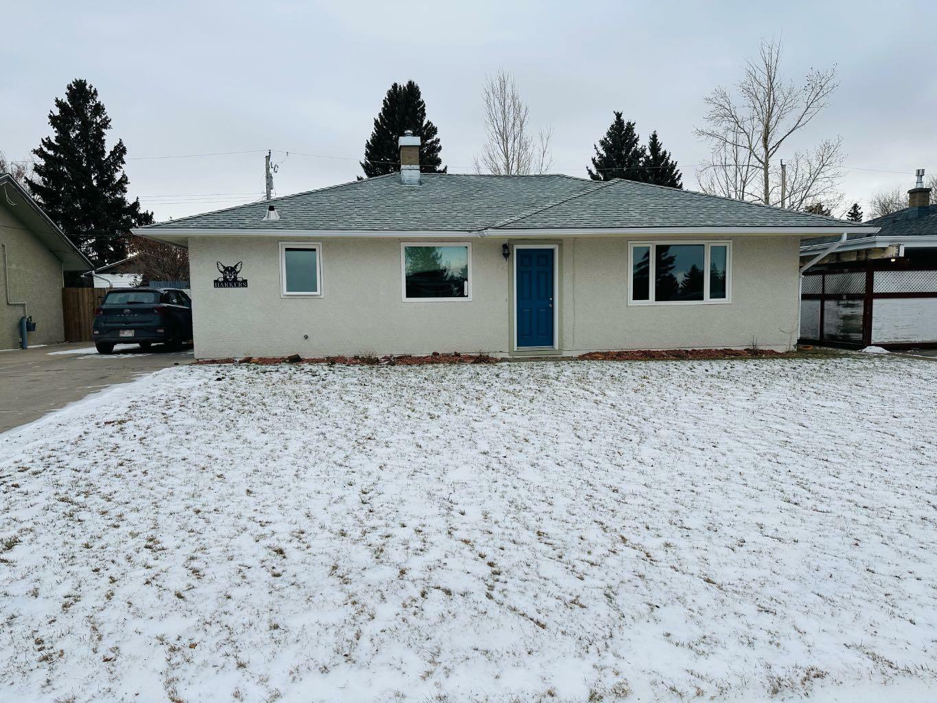 Property Photo:  1206 13 Avenue N  AB T1H 1S8 