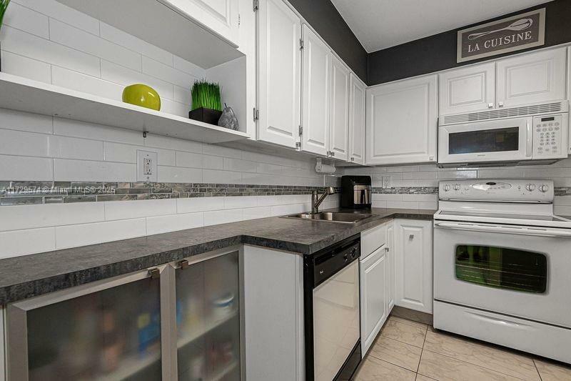 Property Photo:  17800 Atlantic Blvd 203  FL 33160 