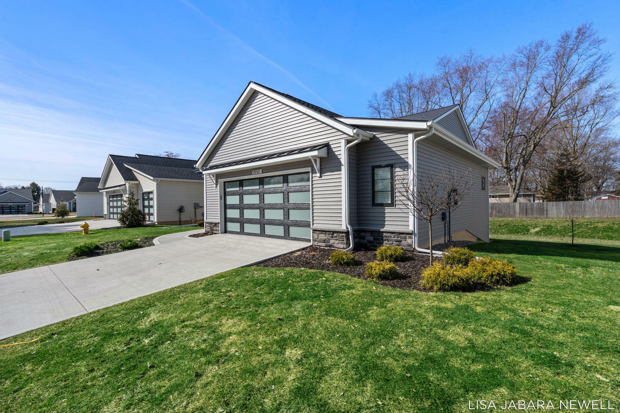 Property Photo: 5697 Vandebunte Court MI 49426