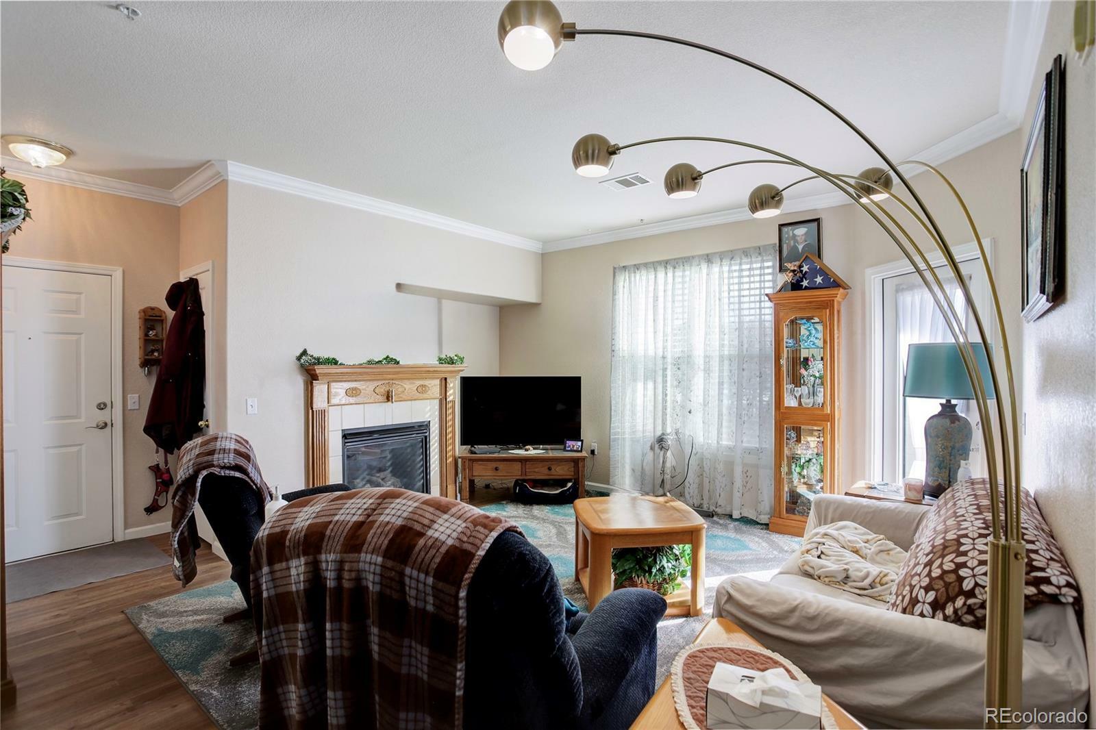 Property Photo: 19049 E Warren Drive 105 CO 80013