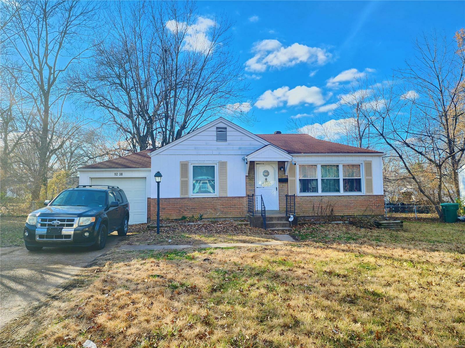 Property Photo:  1238 Hoyt Drive  MO 63137 