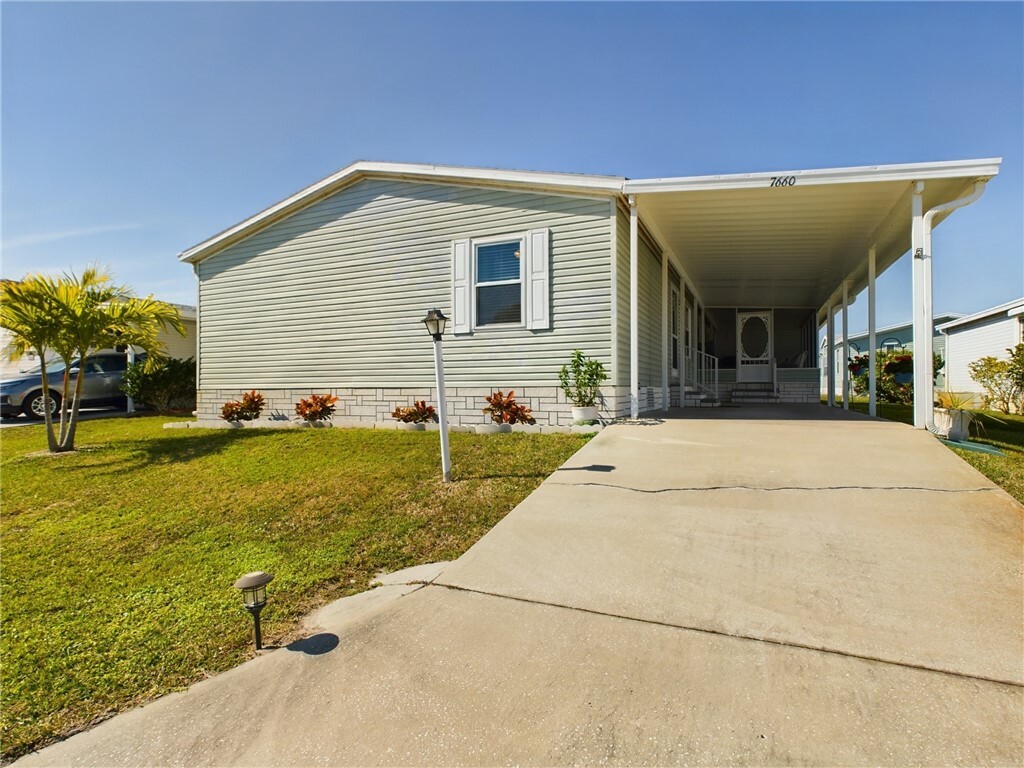 Property Photo:  7660 Kyak Court Q19  FL 32976 