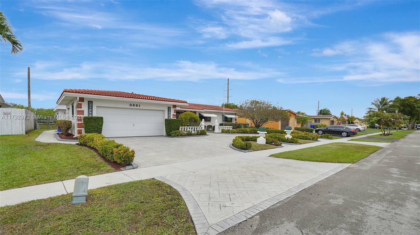 Property Photo:  8661 NW 24th Ct  FL 33024 