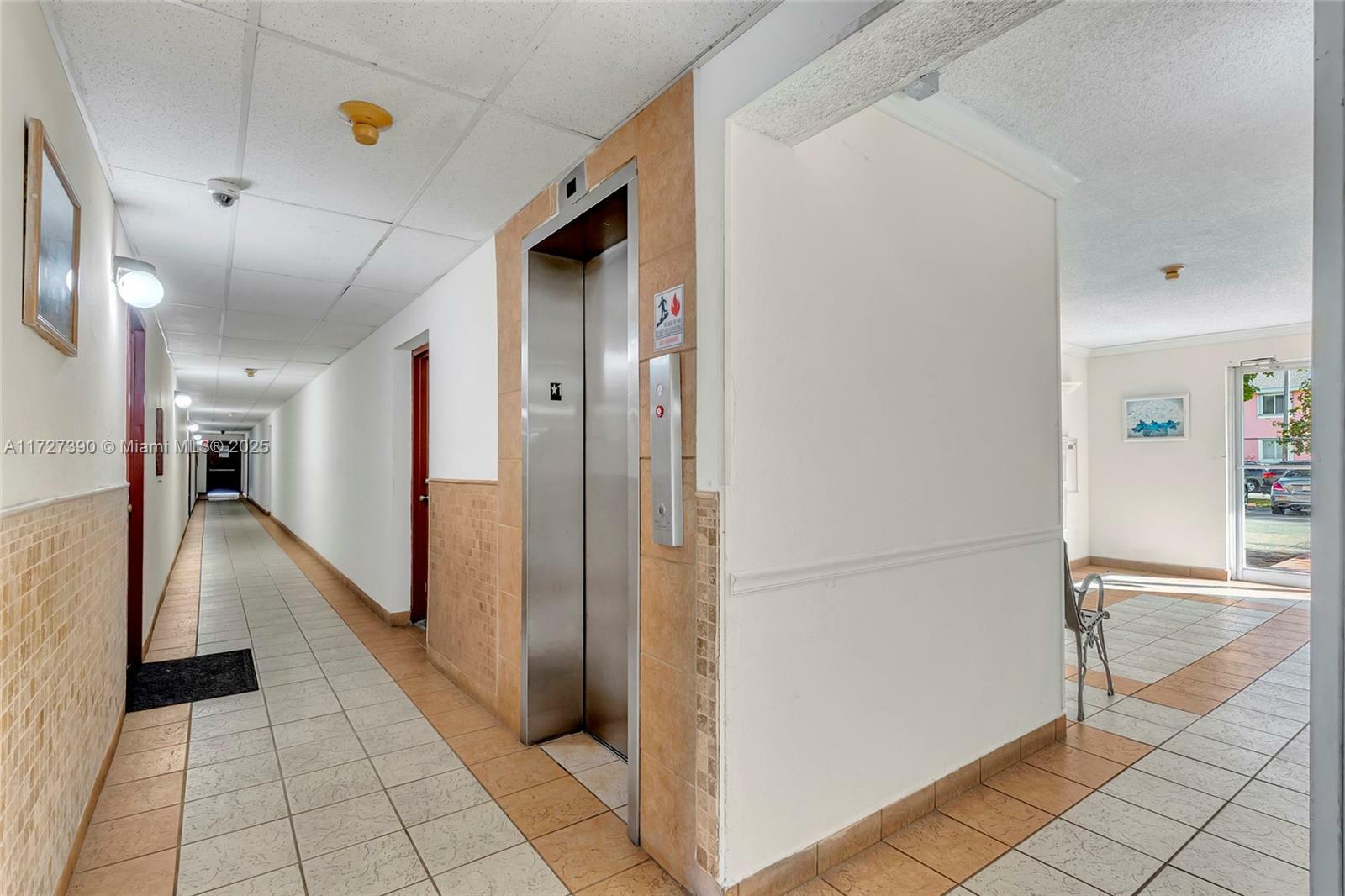 Property Photo:  4705 NW 7th St 103-7  FL 33126 