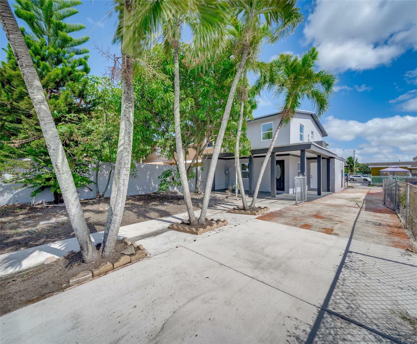 Property Photo:  19405 NW 47th Ave  FL 33055 