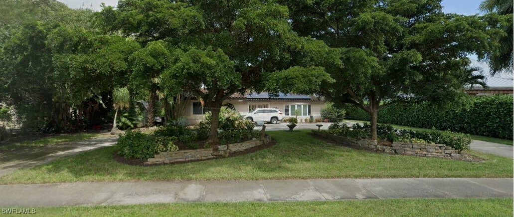 Property Photo:  2000 Crayton Road  FL 34102 