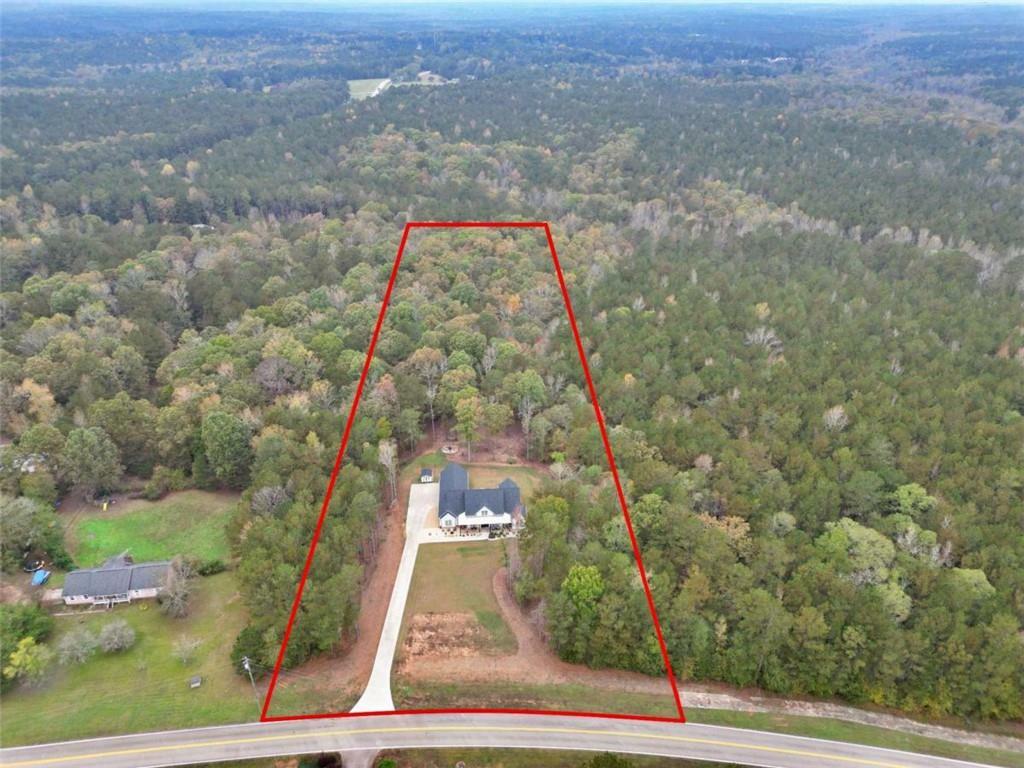 Property Photo:  3911 Peeksville Road  GA 30248 